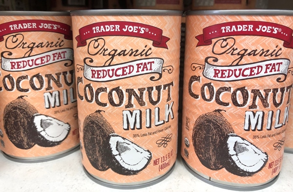 Several cans of Trader Joe's Organic Coconut Milk