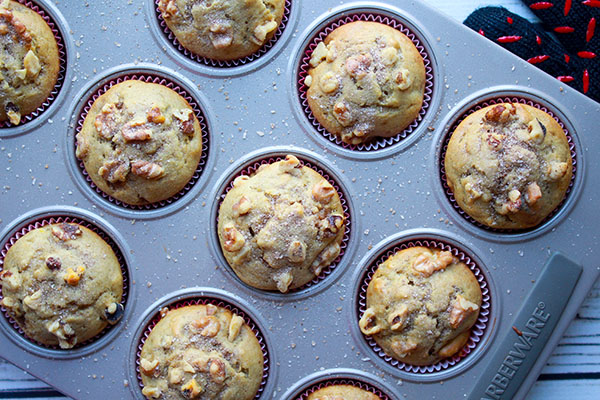 Banana nut muffins in a muffin tin right out of the oven.