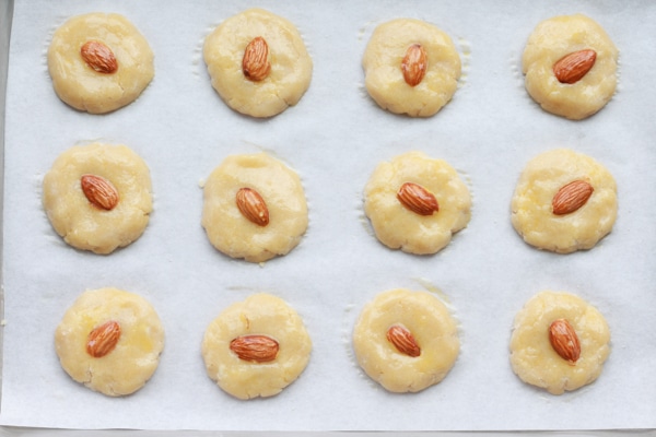 uncooked Chinese almond cookies on baking sheet ready to be put in the oven.