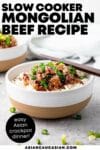 Slow Cooker Mongolian Beef in a bowl with chopsticks on top.